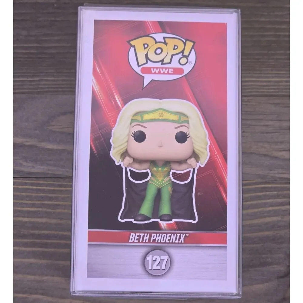 Funko Pop! WWE: Beth Phoenix #127 Ships In Protector